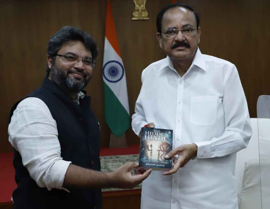 Author Akshat Gupta presents his books The Hidden Hindu to Shri M Venkaiah Naidu, Vice President of India