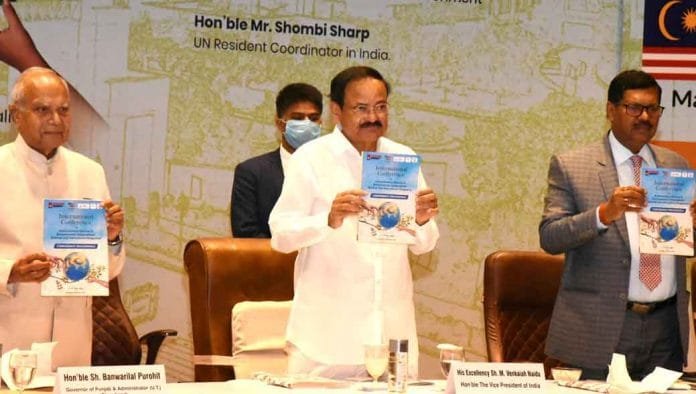 The-Vice-President,-Shri-M. The Vice President, Shri M. Venkaiah Naidu releasing the Annual Report of Chandigarh University, in Mohali