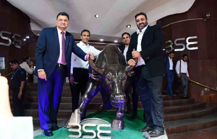 (L-R) Mr.Dharmesh Mehta, Managing Director, Dam Capital & Mr.Sandeep Tandon, Executive Chairman, Syrma SGS along with others at BSE.