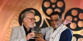Anurag receiving the award from Mikael Svensson