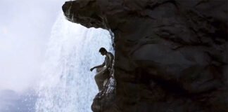 Prabhas as Baahubali on a battlefield scene from the 4K re-release trailer, October 2025