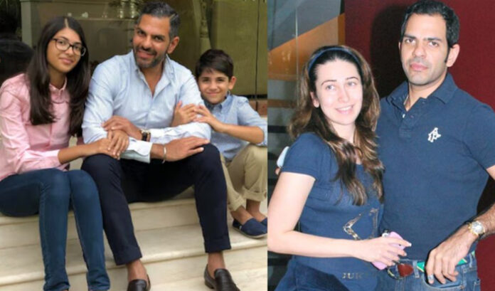 Karisma-Kapoor-with-her-chi Karisma Kapoor with her children Samaira and Kiaan Raj Kapoor during a public appearance, linked to the Sunjay Kapoor will dispute.