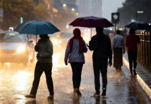 IMD Issues Heavy Rainfall Alert Across 18 States — Orange Warning in Several Regions “People walking through waterlogged streets in India as the IMD issues a heavy rainfall alert across 18 states.