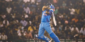 Suryakumar Yadav hitting a six during India vs Australia T20 match in Vizag 2025