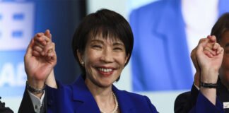 anae Takaichi waving to supporters after being elected Japan’s first female Prime Minister