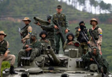 Venezuela Mobilizes Troops Amid U.S. Military Presence: Rising Tensions in the Region Venezuelan soldiers mobilizing near the coast in response to U.S. naval presence.
