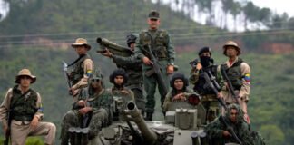Venezuelan soldiers mobilizing near the coast in response to U.S. naval presence.