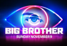 Big Brother Australia Returns: New Host Mel Tracina Teases a Season Full of Authenticity and Drama Big Brother Australia 2025 host Mel Tracina on stage with the Big Brother eye logo glowing behind her.”