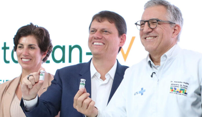 Brazil Approves Butantan-DV Single-Dose Dengue Vaccine — 2025 scientists at Brazil’s Butantan Institute holding a vial of the newly approved single-dose dengue vaccine.