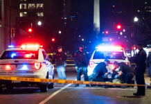 Afghan SIV suspect, Washington DC shooting, National Guard attack, Rahmanullah Lakanwal arrest, FBI investigation, immigration security debate, ISIS propaganda found Police and federal agents securing the scene of a shooting near a National Guard recruiting office in Washington, D.C.