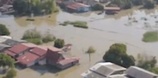 Aerial view of flooded Sri Lankan coastal towns after Cyclone Ditwah landfall.