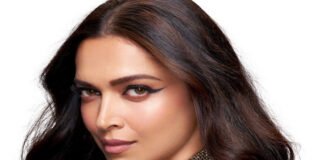 Deepika Padukone at a red carpet event, announced as the lead opposite Chris Evans in a new Hollywood action film.