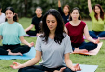 India Sets 3 Guinness World Records Under ‘Swasth Nari’ Campaign — A Triumph of Women’s Health and Unity Thousands of women performing yoga during India’s Swasth Nari campaign event 2025.” Image: Guinness World Records certificate ceremony