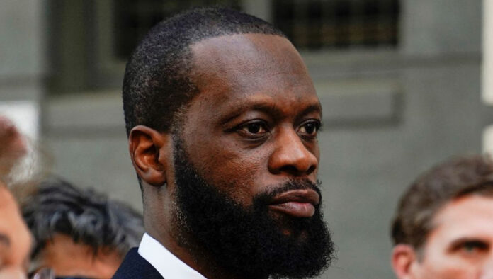 pras-michel-14-year-sentenc Fugees rapper Pras Michel leaving federal courthouse in Washington DC