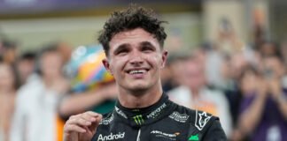 Lando Norris celebrates after winning the 2025 Formula One World Championship at the Abu Dhabi Grand Prix.