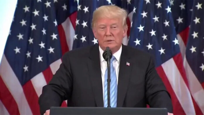 donald-trump-tariffs-announ President Donald Trump announcing potential tariffs on semiconductors and electronics in 2025