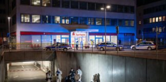 German police outside Sparkasse bank after Hollywood-style vault heist