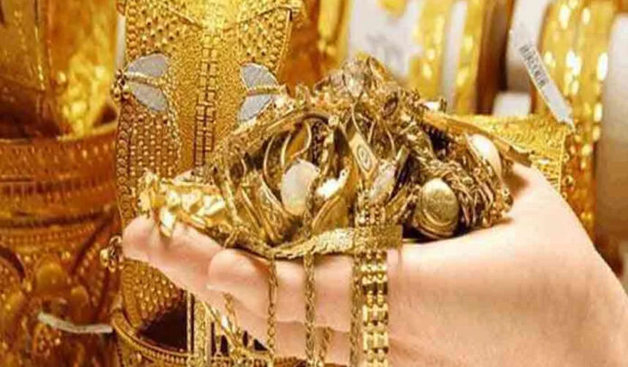gold-silver-bullion-record- Stacked gold and silver bullion bars with rising price chart showing record highs in December 2025