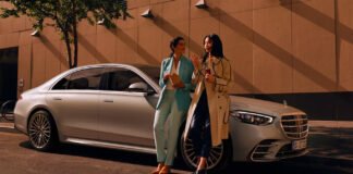 Mercedes-Benz luxury cars displayed at an Indian showroom amid price hike announcement
