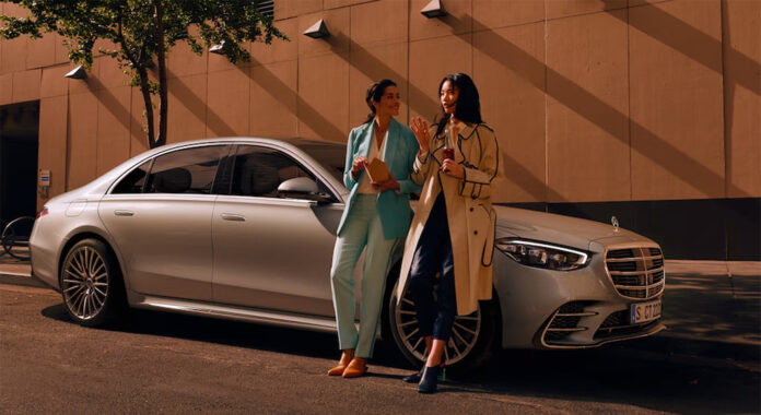 Mercedes-Benz luxury cars displayed at an Indian showroom amid price hike announcement