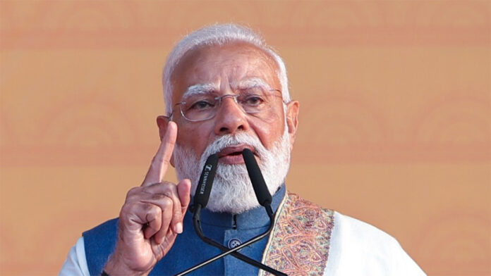 pm-modi-new-year-eve-addres Prime Minister Narendra Modi delivering New Year's Eve national address 2025 from New Delhi podium