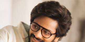 eja Sajja smiling in interview, discussing Hindi accent and Dharma Productions plans