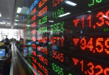 Stock Market Opens in Red: Sensex Falls 228 Points, Nifty Slips Below 25,700 on Weak Monday Start Indian stock market screen showing Sensex and Nifty falling in early trade