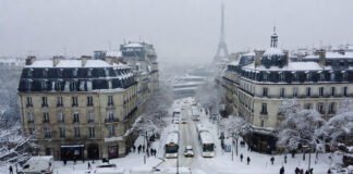 Snow-covered Paris streets as winter storm disrupts travel across Europe