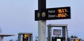 Petrol and diesel price board at an Indian fuel station showing updated rates