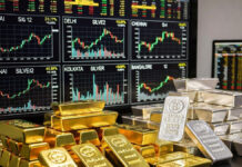 Gold Prices Hit ₹1,40,450 per 10g on January 12; Silver at ₹2,59,900 per Kg—City-Wise Rates Across India Gold and silver bars with rising price chart for January 12 across Indian cities