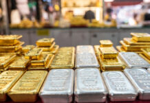 Global Market Turmoil Triggers Major Shake-Up in India’s Gold and Silver Prices — Check Today’s Latest Rates Before Buying Gold and silver bars displayed at an Indian bullion market amid rising prices