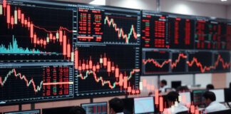 Indian stock market screens showing Sensex and Nifty trading in the red