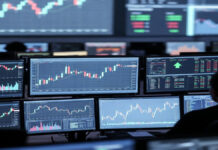 Indian Stock Market Opens Flat, Turns Positive After Thursday’s Sharp Selloff Indian stock market opening bell with Sensex and Nifty charts showing early gains