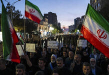 Iran Shuts Down Internet Nationwide as Anti-Government Protests Intensify, Death Toll Rises Protesters gather in Tehran during anti-government demonstrations amid internet blackout