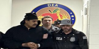 enezuelan President Nicolas Maduro entering US federal court in Washington for drug trafficking hearing on January 5, 2026, with security detail.