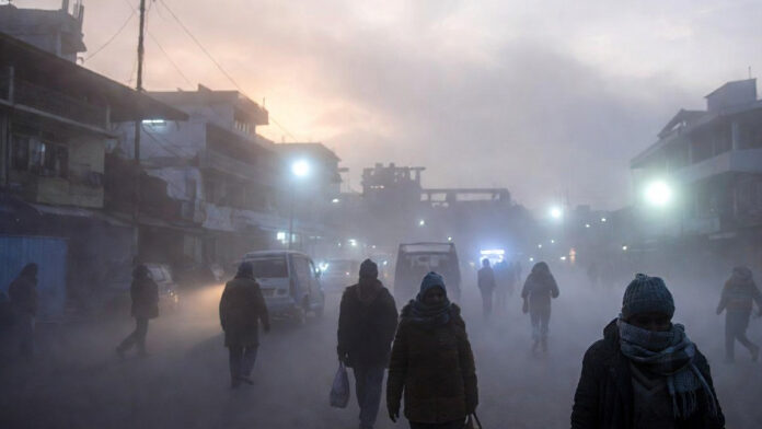 Severe cold wave in North India with dense fog and people walking in freezing temperatures