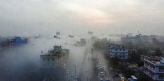 Dense fog and cold wave conditions reduce visibility on a winter morning in North India.