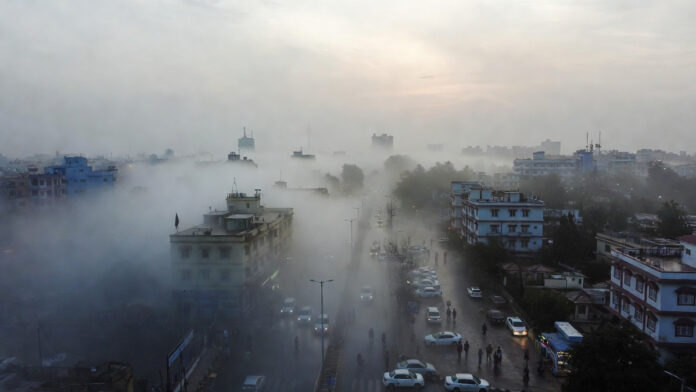 north-india-cold-wave-fog-j Dense fog and cold wave conditions reduce visibility on a winter morning in North India.