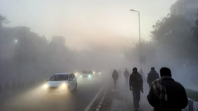 Dense fog and cold wave conditions in New Delhi as North India shivers under extreme winter temperatures.