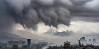 Rain and snowfall triggered by western disturbance across northwest India with cloudy skies and winter conditions