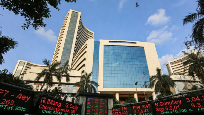 nse-january-15-trading-sett NSE building in Mumbai with stock market screens displaying trading and settlement holiday notice