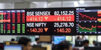 BSE Sensex and NSE Nifty indices in red showing decline at market open