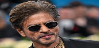 Shah Rukh Khan during a public appearance amid retirement rumors in 2026