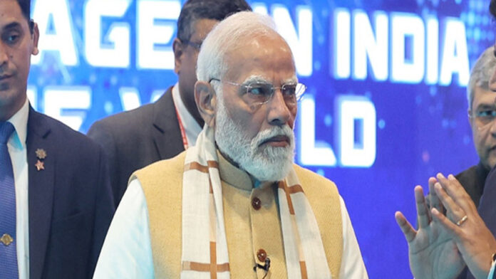 PM-at-the-inauguration-of-t Prime Minister Narendra Modi addressing delegates at India AI Impact Summit 2026