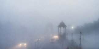Dense morning fog reduces visibility over Delhi roads and landmarks on a cold February day in 2026