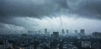 Dark rain clouds over Delhi skyline during weather alert