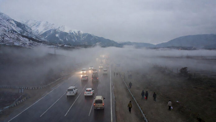 india-weather-today-dense-f Dense fog and winter rain affect roads and daily life across North India