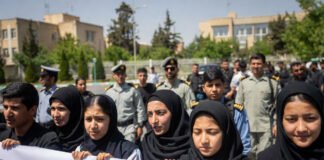 Students protesting at a university campus in Tehran amid heightened security