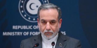 Iranian Foreign Minister Abbas Araghchi speaking during a press conference about nuclear talks