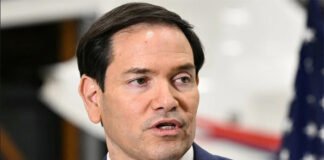 Marco Rubio speaking at a diplomatic press conference in Budapest